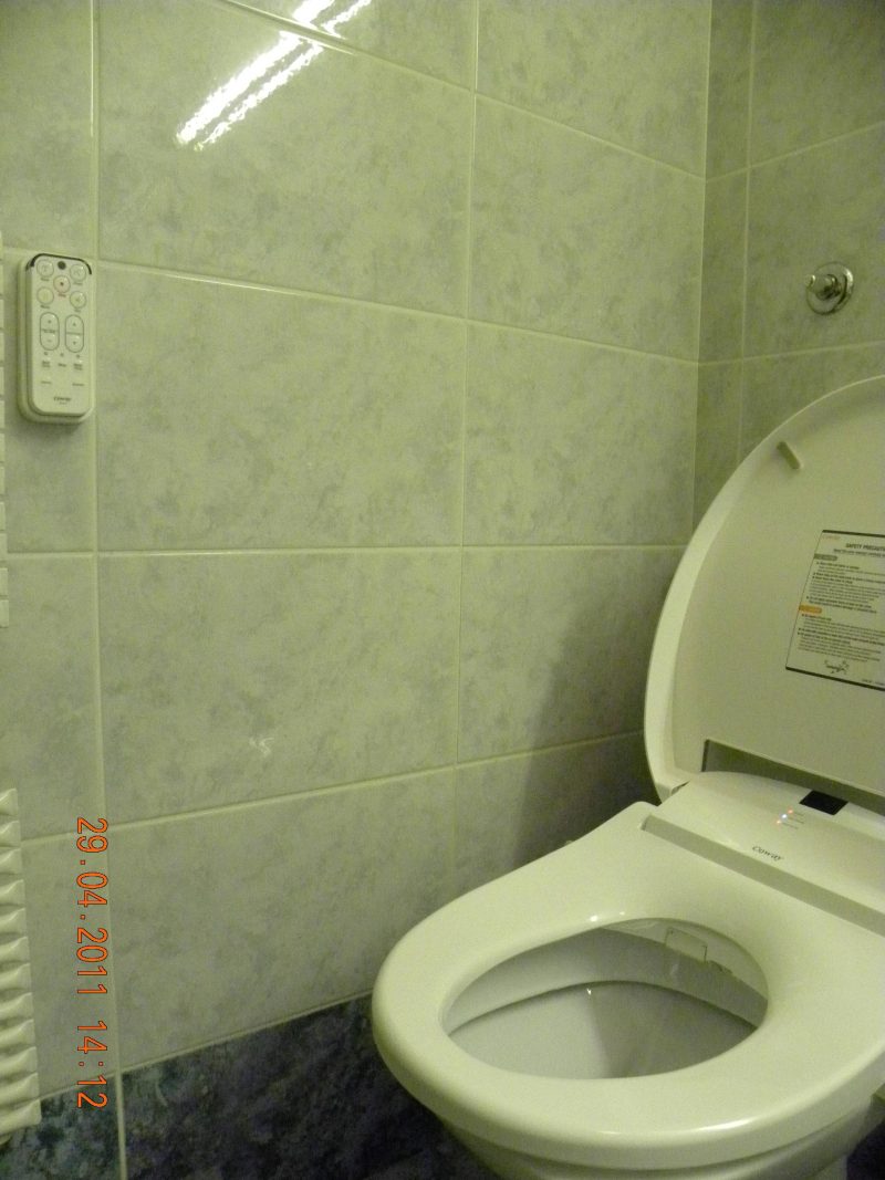 Another view of a Coway BA13-BE bidet seat installation