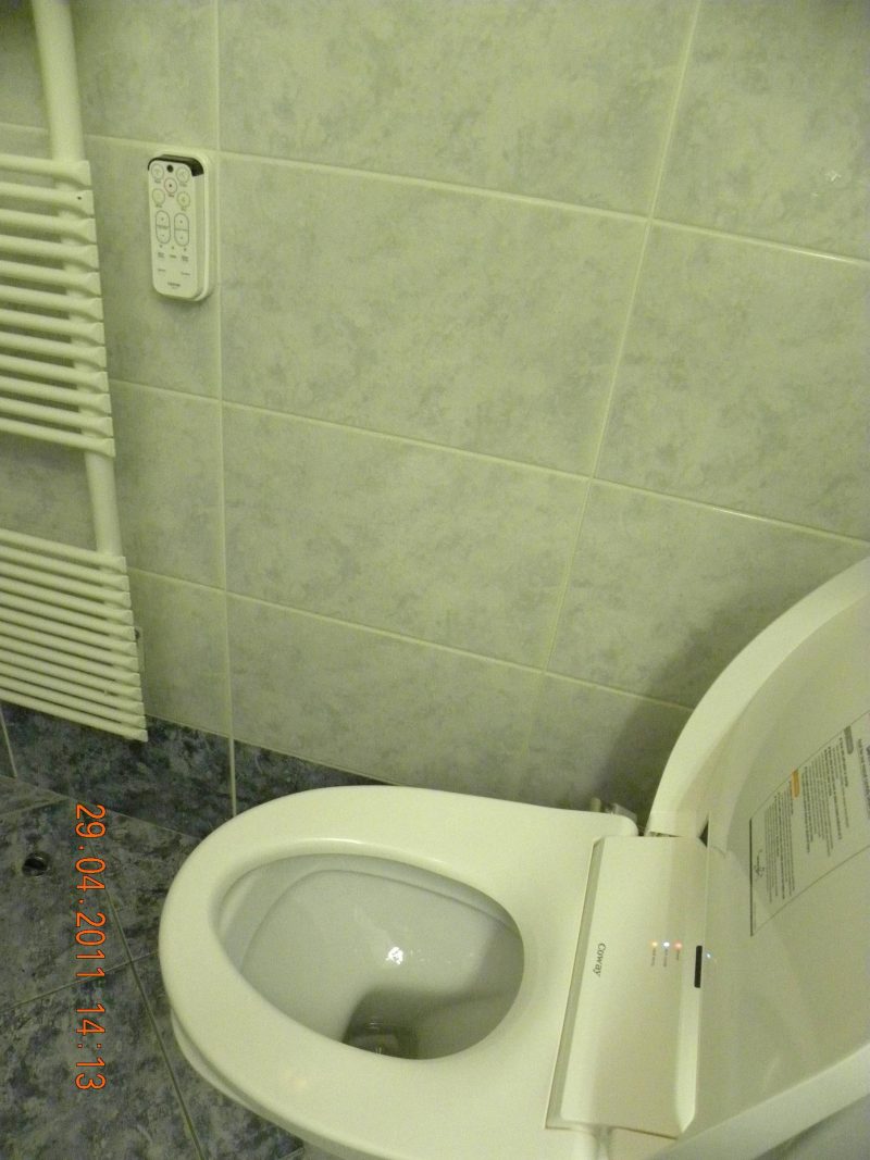 Coway BA13 bidet seat showing the seat and toilet-pan combination