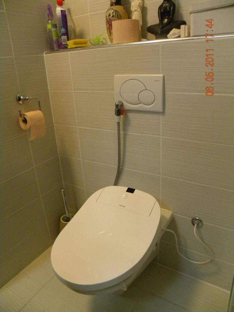 Coway BA13-BE installation showing the water and electrical connections